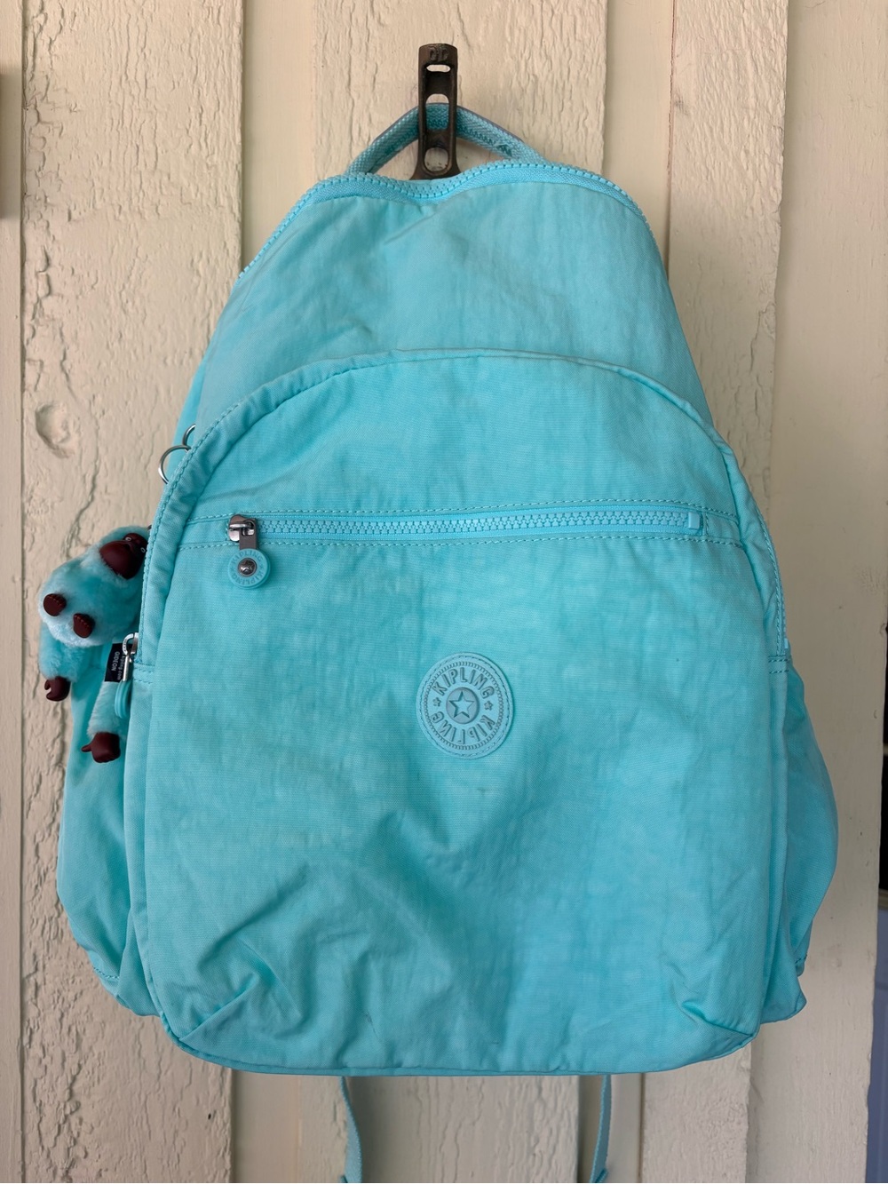 Kipling Light Teal Backpack with Monkey Keychain